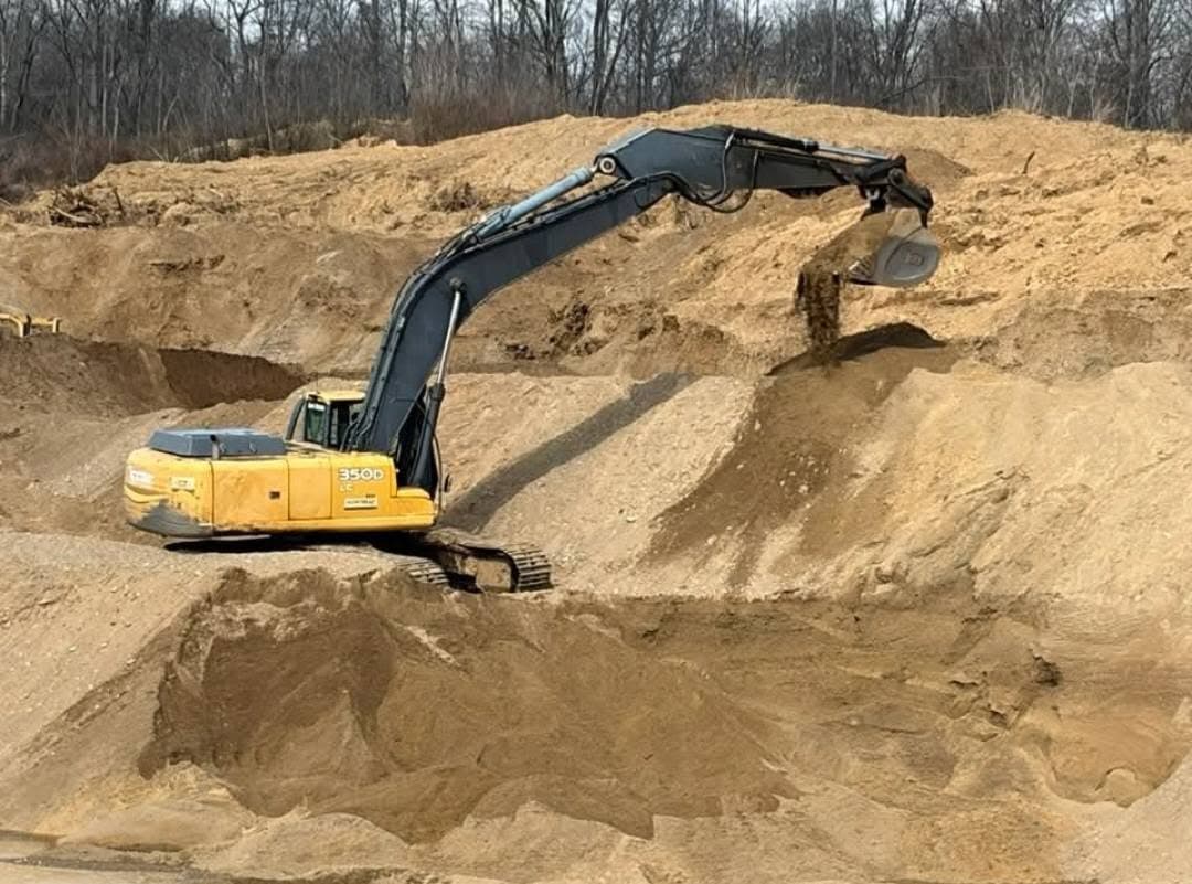 Excavator loading washed sand